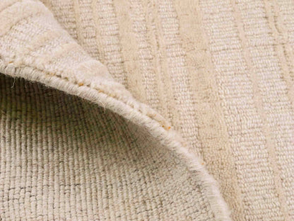 Moderner, Handloom Lori Orientteppich von Khademi aus Wolle, beige. Geometrisches Design. Produziert in Indien. Größe: 150x80cm. Teppichnummer: KB4-1525. Verkauf durch Jupiter Intl.