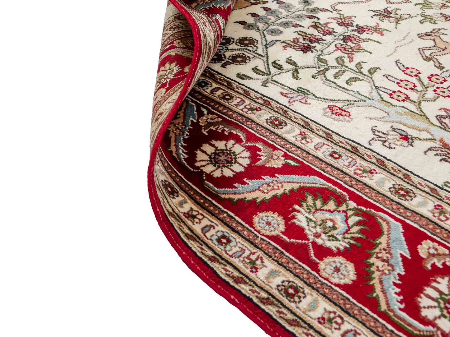 Feiner, handgeknüpfter Art Hereke aus Kunstseide. Ursprung China. Größe: 189 x 120 cm. Hauptfarben: Weiß, Creme, Rot. Vertrieb durch JUPITER Intl.
