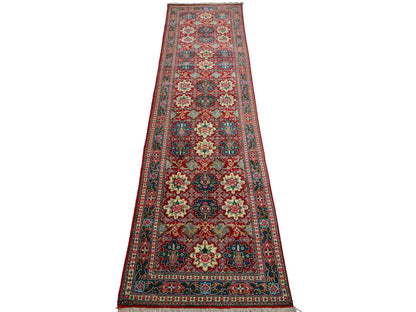 Sehr feiner, handgeknüpfter Ghom Perserteppich aus Seide von Khademi, rot. 297x77 cm. Verkauf durch Jupiter Intl.