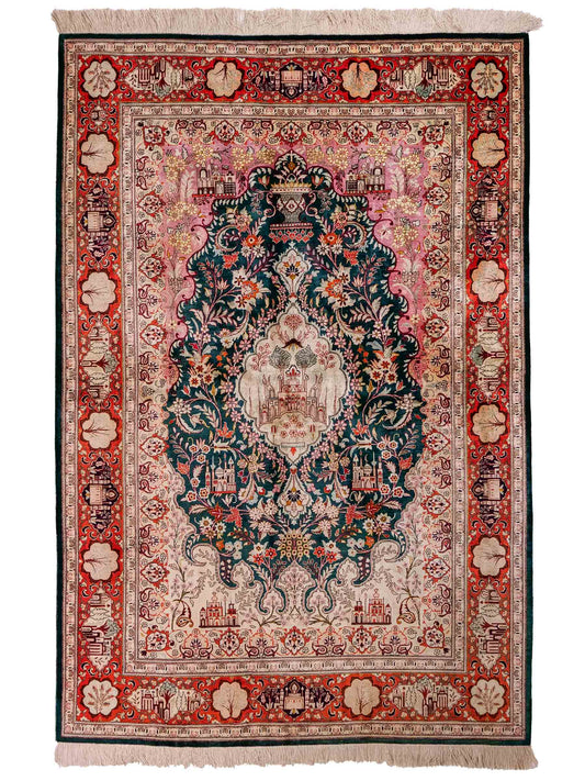 Sehr feiner, handgeknüpfter Ghom Seidenteppich aus reiner Seide mit Medaillon von Khademi. Größe: 198 x 133 cm. Farbe: Grün, orange. RB3-1605. Ursprung: Iran / Persien. Verkauf durch JUPITER Intl.