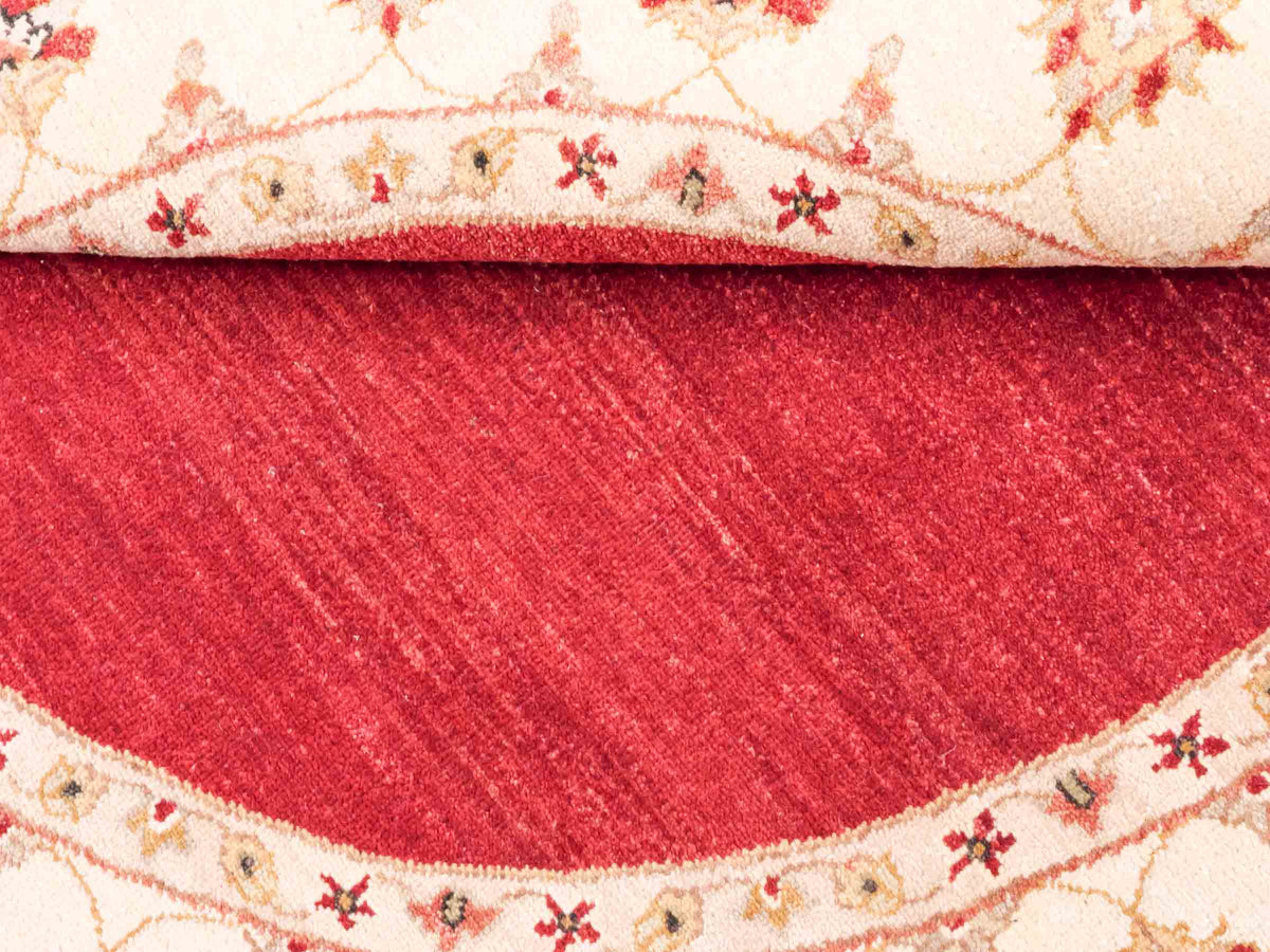 Runder, handgeknüpfter Ziegler Farahan Orientteppich von Khademi aus Wolle, rot, beige. Klassisch-traditionell von Hand geknüpft in Afghanistan. Größe: 150 cm x 150 cm. Teppichnummer: SB3-1135 | Jupiter Intl.