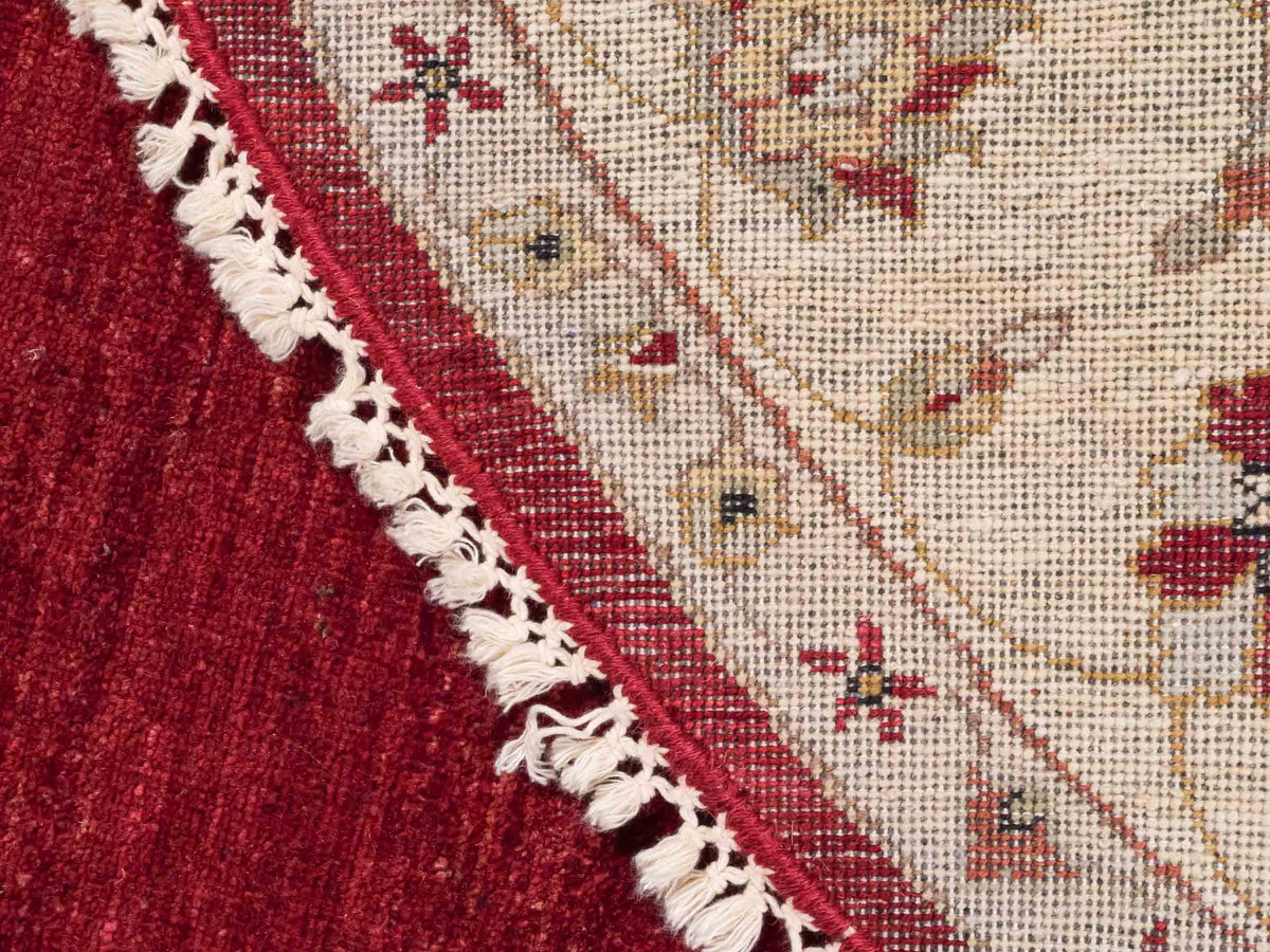 Runder, handgeknüpfter Ziegler Farahan Orientteppich von Khademi aus Wolle, rot, beige. Klassisch-traditionell von Hand geknüpft in Afghanistan. Größe: 150 cm x 150 cm. Teppichnummer: SB3-1135 | Jupiter Intl.