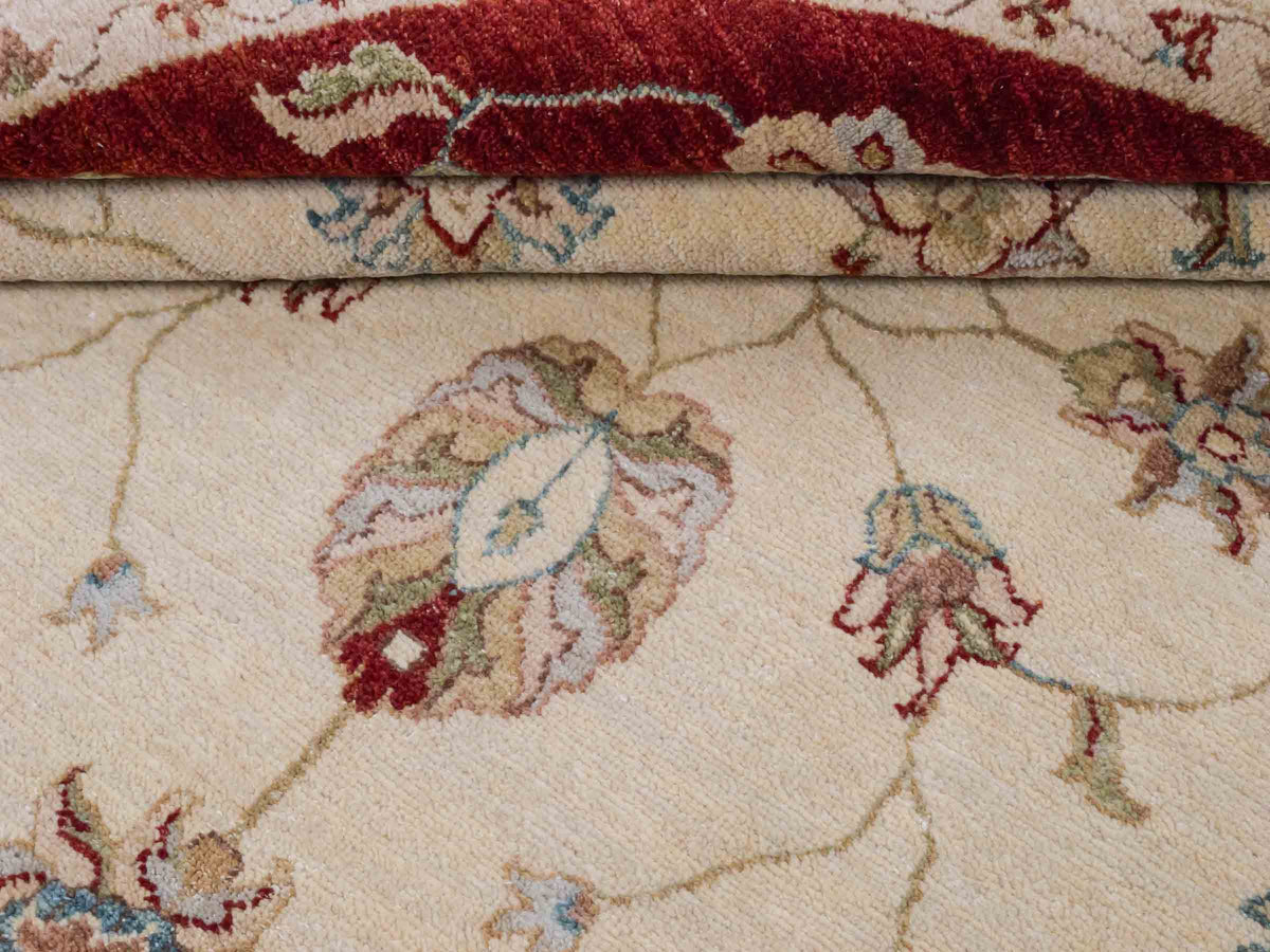 Runder, handgeknüpfter Ziegler Farahan Orientteppich von Khademi aus Wolle, beige, gold, rot. Klassisches Allover-Design. Traditionell von Hand geknüpft in Afghanistan. Größe: 185 cm x 185 cm. Teppichnummer: SB3-1120 | Jupiter Intl.
