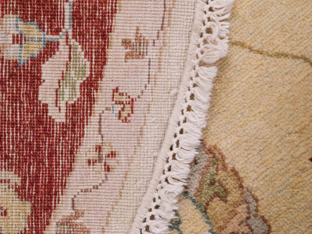 Runder, handgeknüpfter Ziegler Farahan Orientteppich von Khademi aus Wolle, beige, gold, rot. Klassisches Allover-Design. Traditionell von Hand geknüpft in Afghanistan. Größe: 185 cm x 185 cm. Teppichnummer: SB3-1120 | Jupiter Intl.