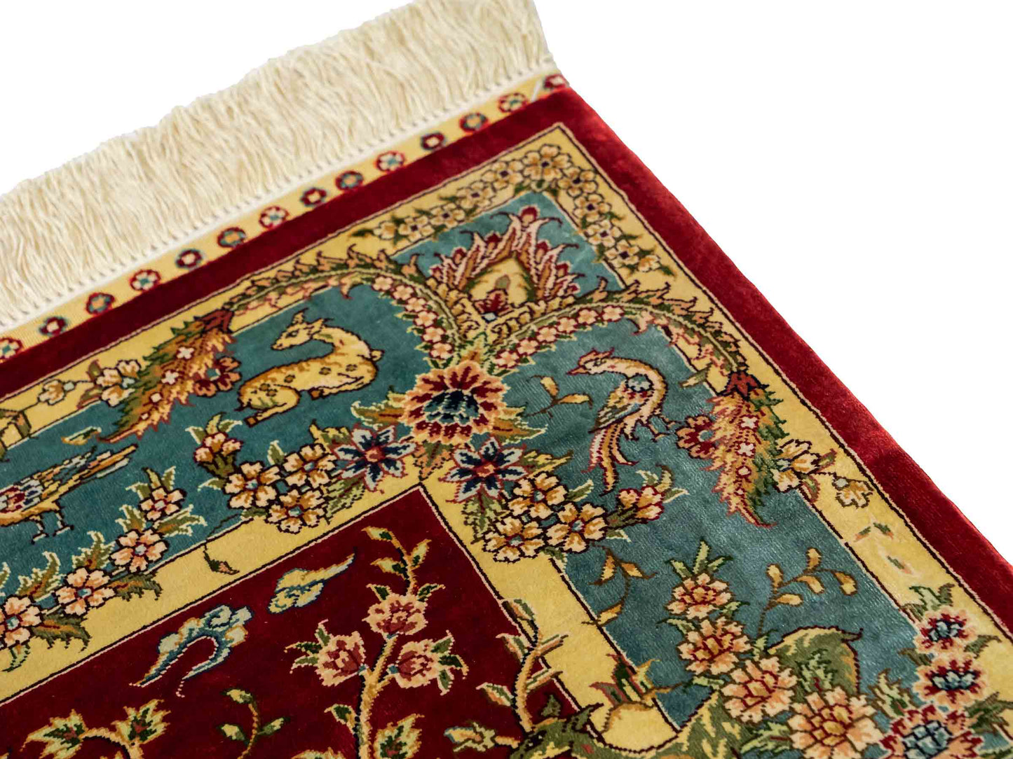 Sehr feiner, handgeknüpfter Khademi Orientteppich mit Ghom Design aus reiner Seide, rot, blau, creme. 124x79 cm. Vertrieb durch Jupiter Intl.