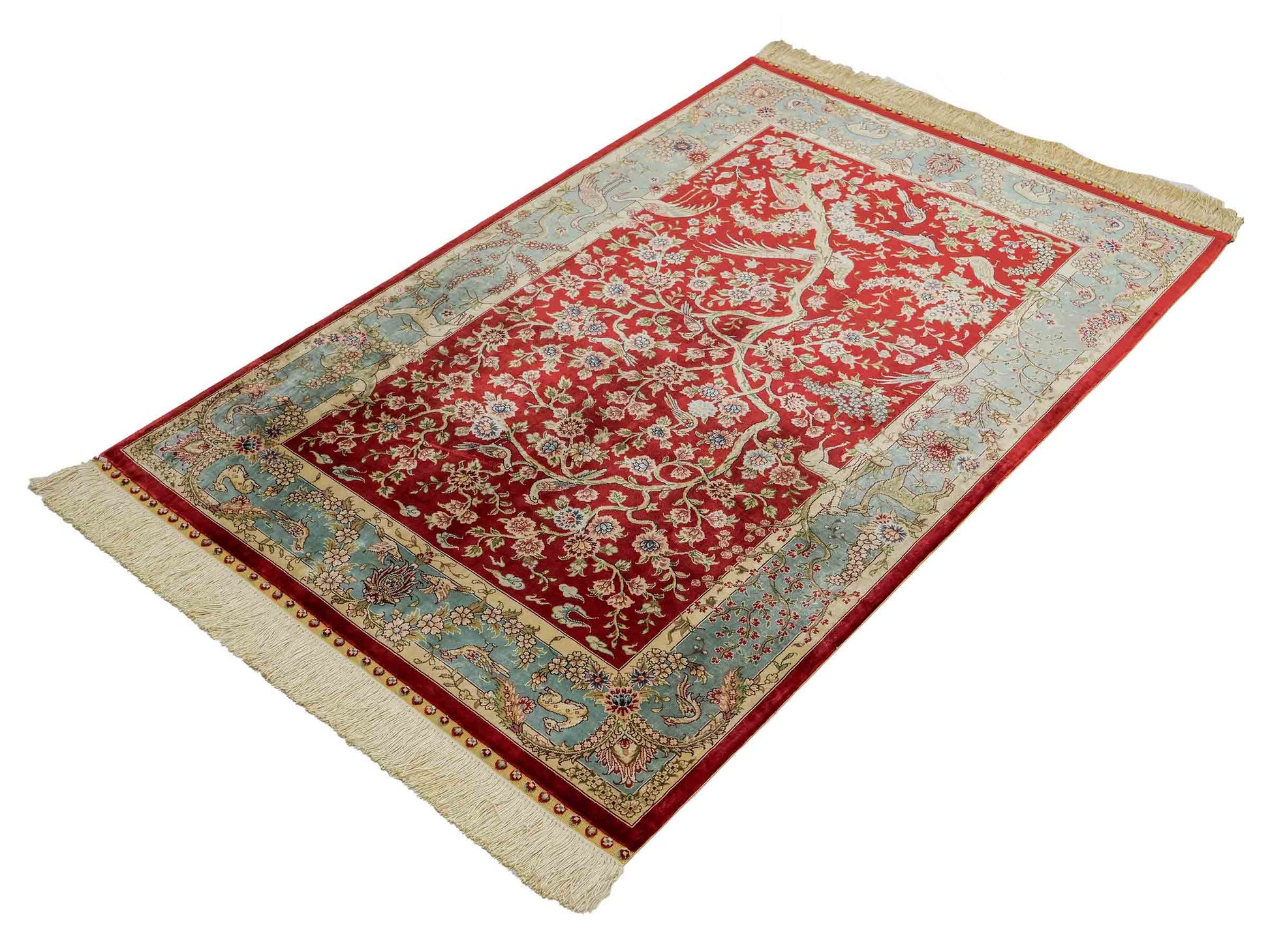 Sehr feiner, handgeknüpfter Khademi Orientteppich mit Ghom Design aus reiner Seide, rot, blau, creme. 124x79 cm. Vertrieb durch Jupiter Intl.