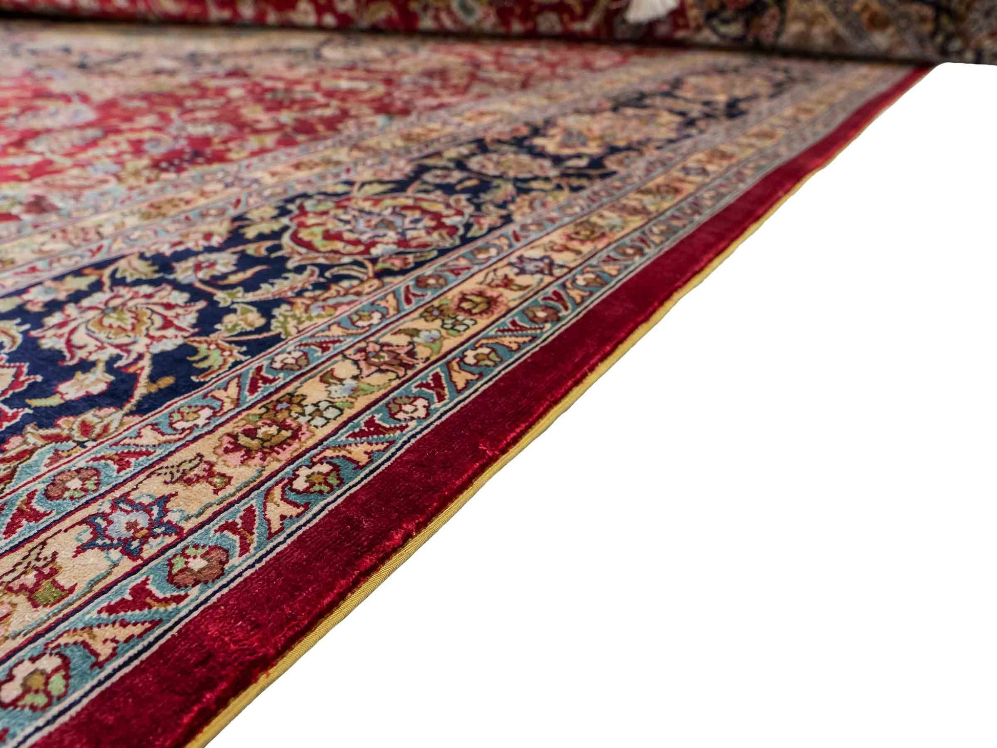 Sehr feiner, handgeknüpfter Khademi Orientteppich mit Ghom Design aus reiner Seide, rot, blau, creme. 278x186 cm. Vertrieb durch Jupiter Intl.