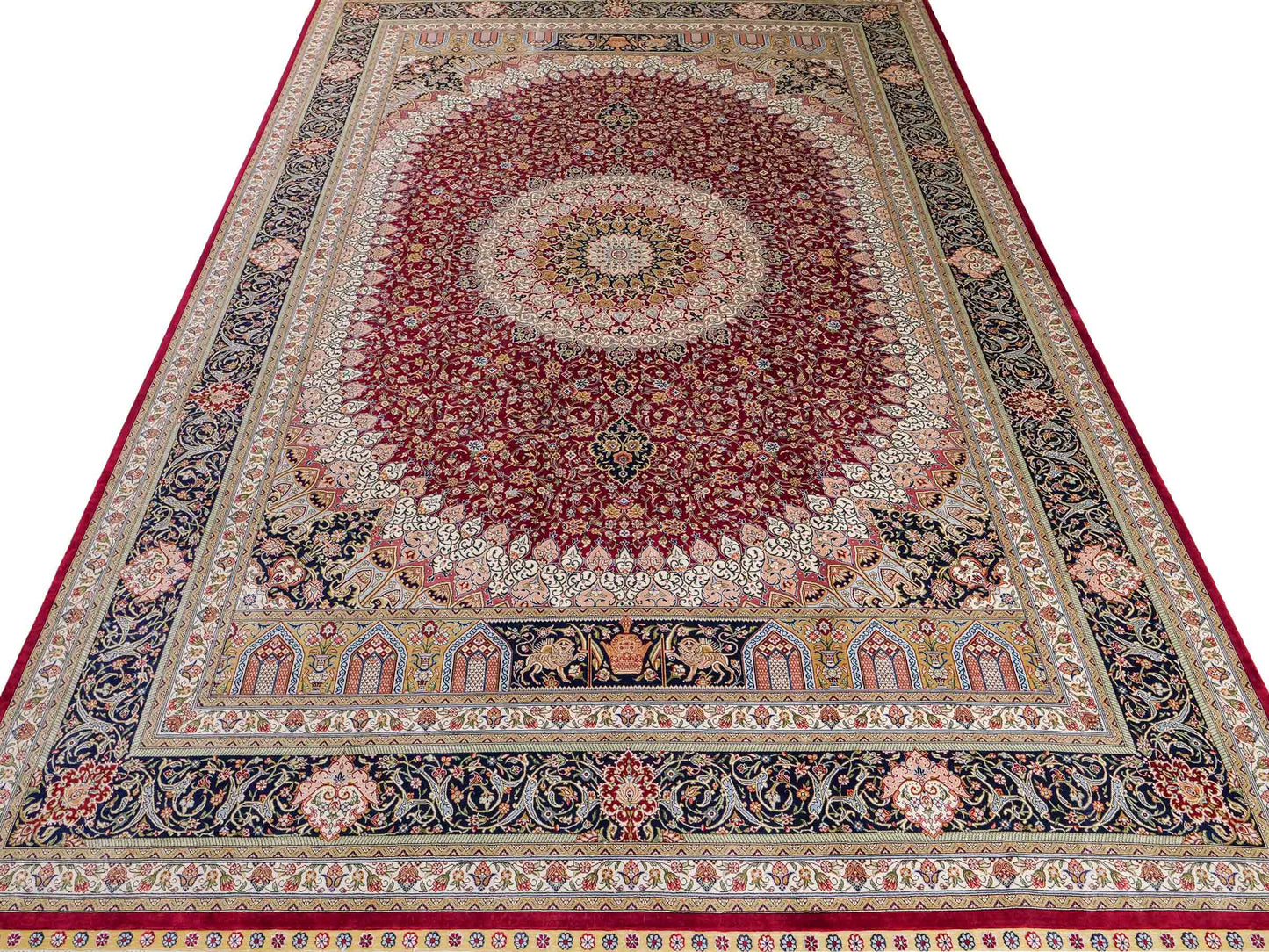 Sehr feiner, handgeknüpfter Khademi Orientteppich mit Ghom Design aus reiner Seide, rot, blau, creme. 305x206 cm. Vertrieb durch Jupiter Intl.