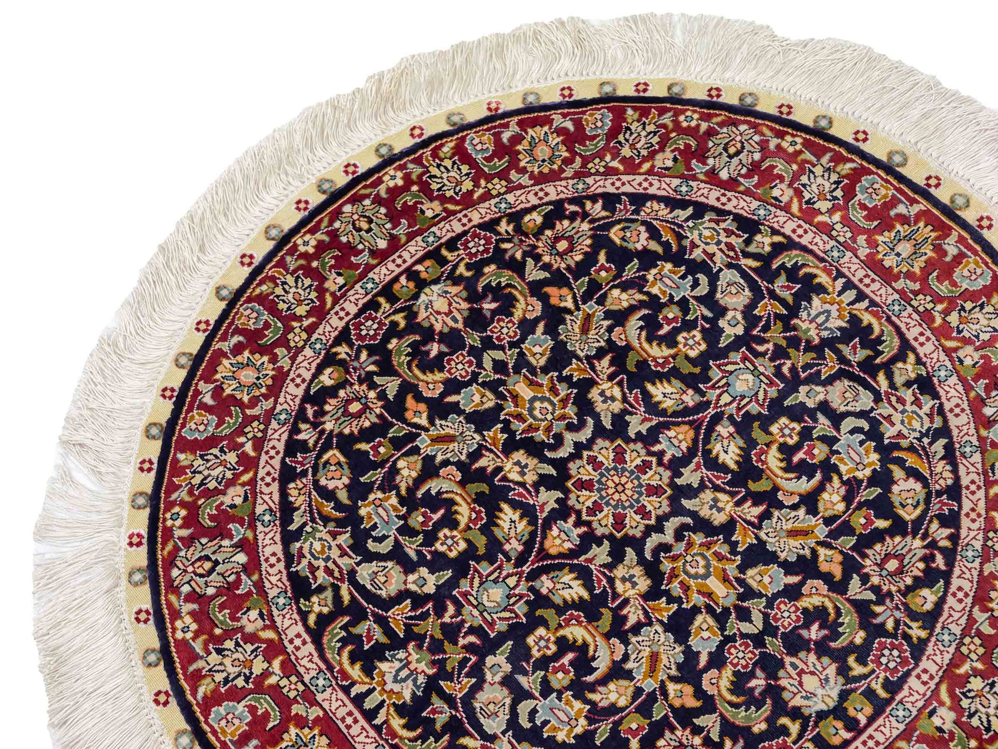 Sehr feiner, handgeknüpfter, runder Khademi Orientteppich mit Ghom Design aus reiner Seide, blau, rot. 61x61 cm. Vertrieb durch Jupiter Intl.