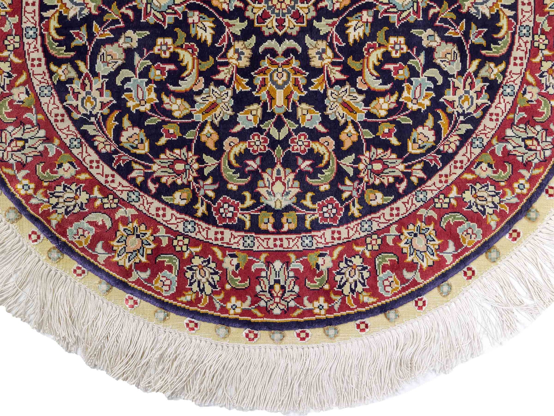 Sehr feiner, handgeknüpfter, runder Khademi Orientteppich mit Ghom Design aus reiner Seide, blau, rot. 61x61 cm. Vertrieb durch Jupiter Intl.