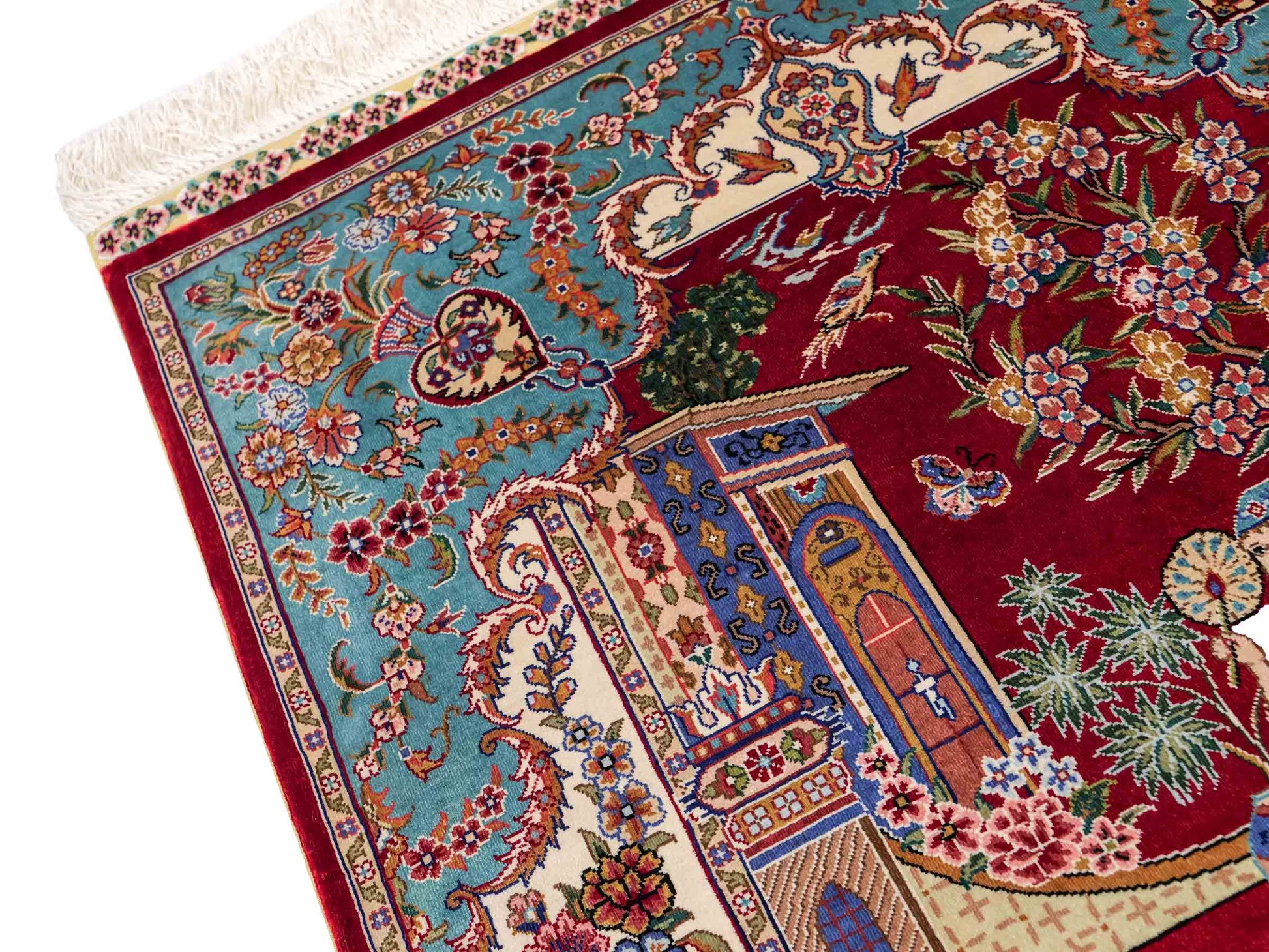 Sehr feiner, handgeknüpfter Khademi Orientteppich mit Ghom Design aus reiner Seide, rot, blau, creme. 92x63 cm. Vertrieb durch Jupiter Intl.