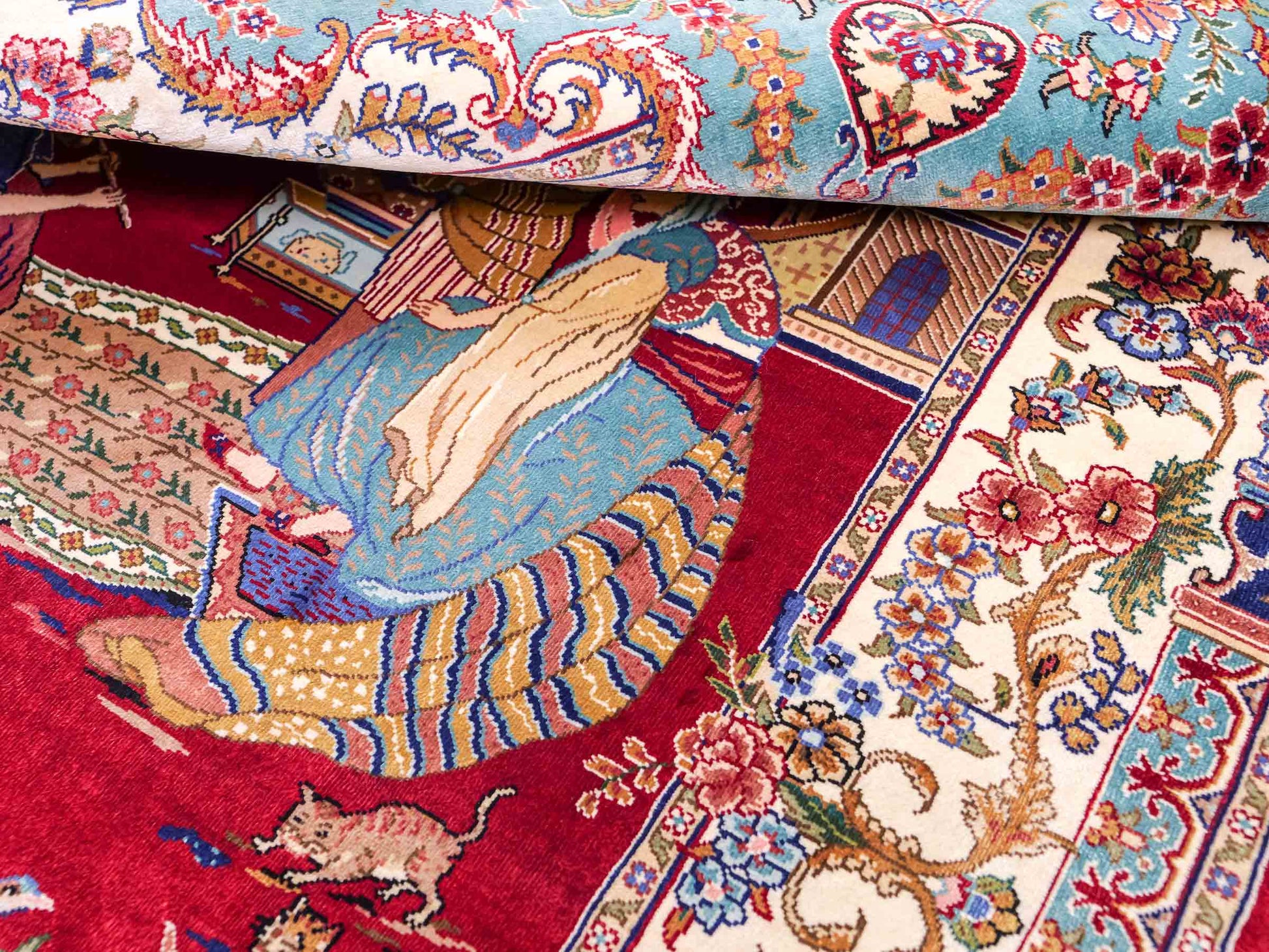 Sehr feiner, handgeknüpfter Khademi Orientteppich mit Ghom Design aus reiner Seide, rot, blau, creme. 92x63 cm. Vertrieb durch Jupiter Intl.