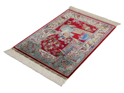 Sehr feiner, handgeknüpfter Khademi Orientteppich mit Ghom Design aus reiner Seide, rot, blau, creme. 92x63 cm. Vertrieb durch Jupiter Intl.