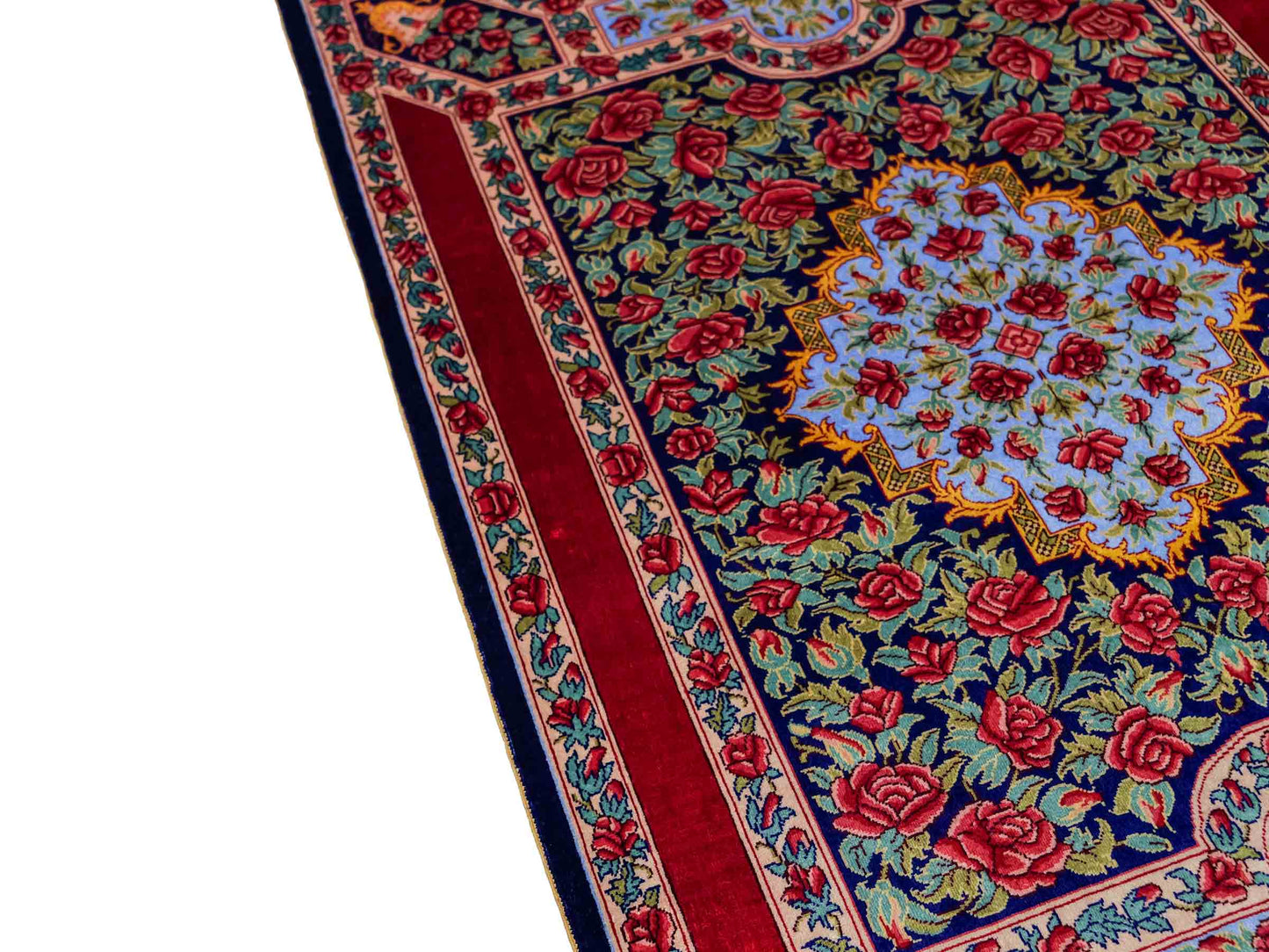 Sehr feiner, handgeknüpfter Khademi Orientteppich mit Ghom Design aus reiner Seide, blau, rot, grün. 94x63 cm. Vertrieb durch Jupiter Intl.