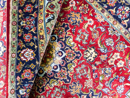 Sehr feiner, handgeknüpfter Khademi Orientteppich mit Hereke Design aus reiner Seide, rot, blau. 122x78 cm. Vertrieb durch Jupiter Intl.