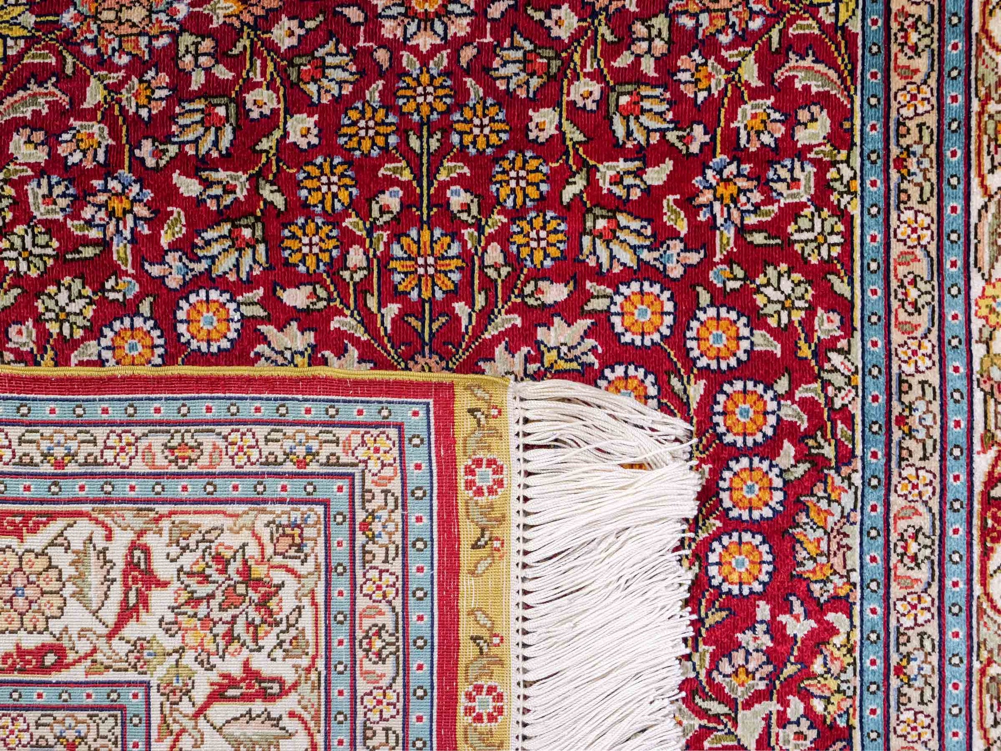 Sehr feiner, handgeknüpfter Khademi Hereke Orientteppich aus Seide, rot. 156x94 cm. Vertrieb durch Jupiter Intl.