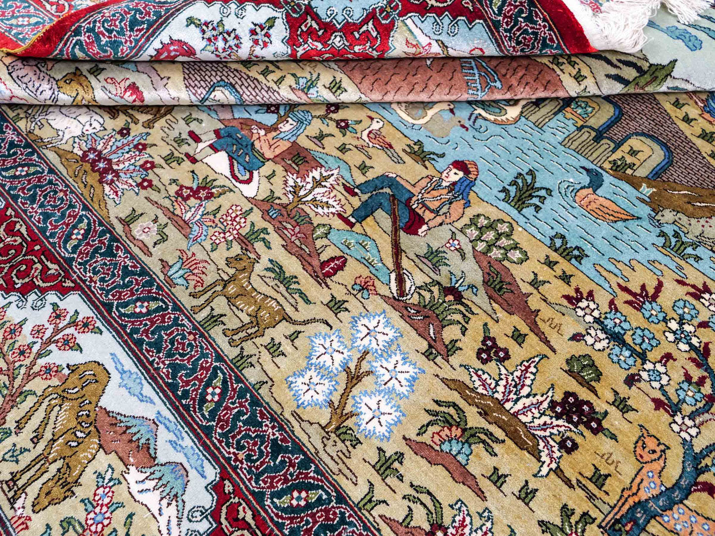Sehr feiner, handgeknüpfter Khademi Orientteppich mit Hereke Design aus reiner Seide, rot, multicolor. 190x124 cm. Vertrieb durch Jupiter Intl.