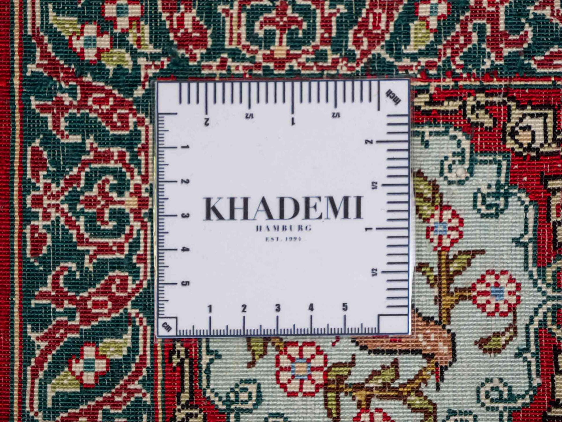 Sehr feiner, handgeknüpfter Khademi Orientteppich mit Hereke Design aus reiner Seide, rot, multicolor. 190x124 cm. Vertrieb durch Jupiter Intl.