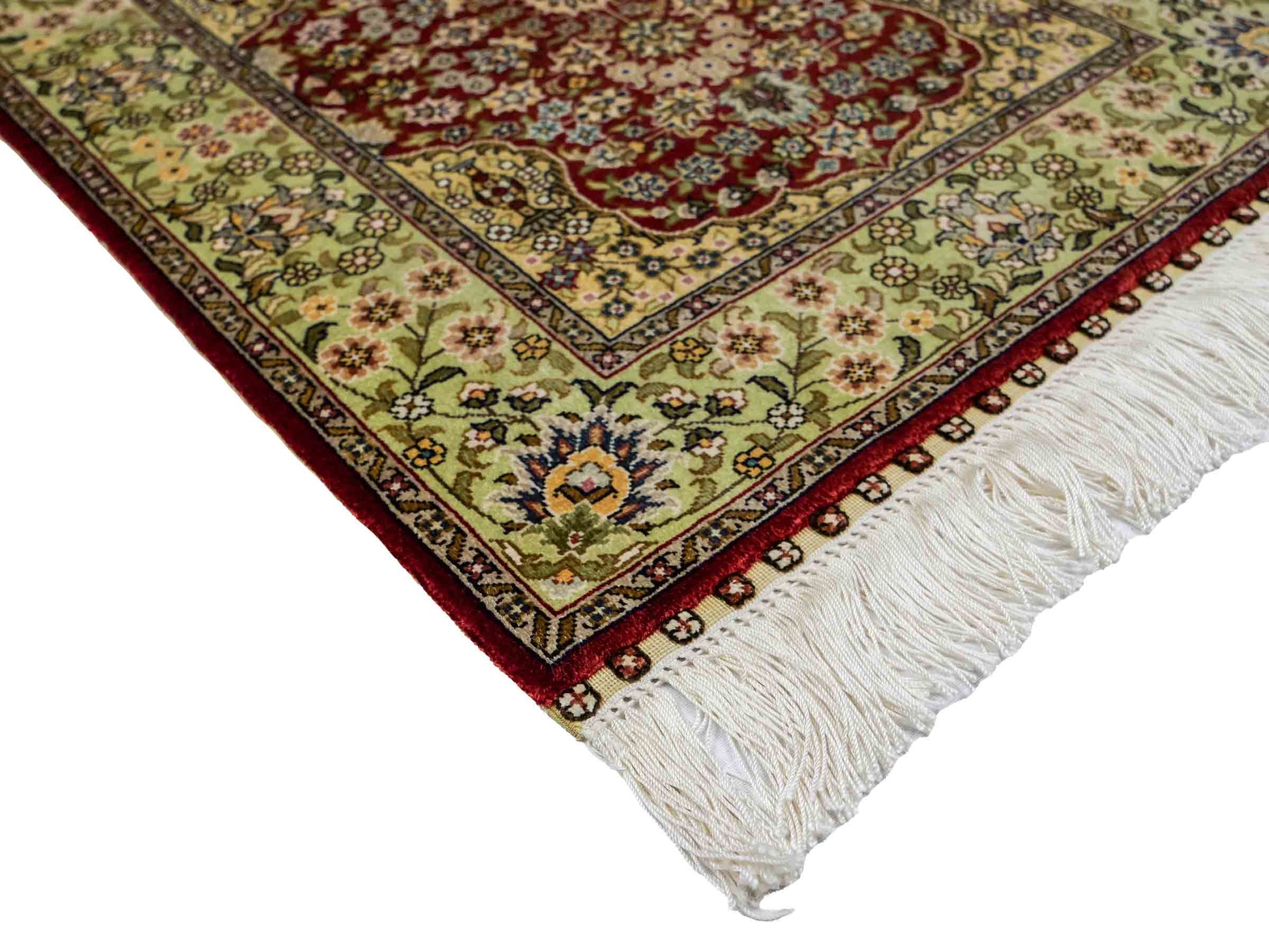 Sehr feiner, handgeknüpfter Khademi Orientteppich mit Hereke Design aus reiner Seide, rot, grün. 62x47 cm. Vertrieb durch Jupiter Intl.