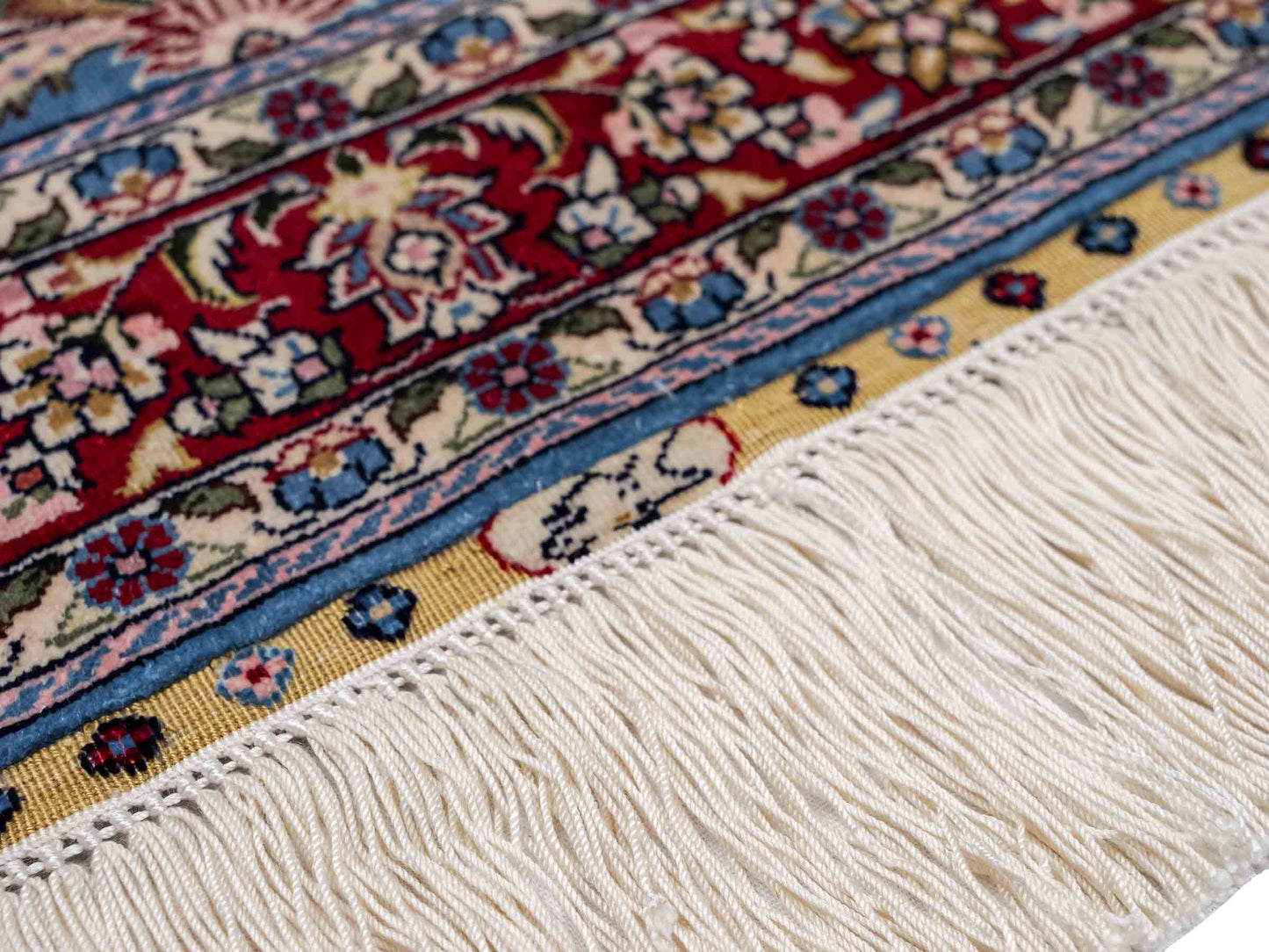 Sehr feiner, handgeknüpfter Khademi Orientteppich mit Hereke Design aus reiner Seide, blau, rot, creme. 65x47 cm. Vertrieb durch Jupiter Intl.