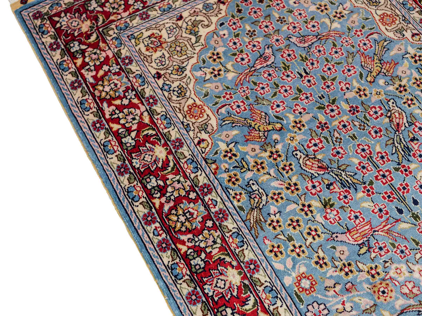 Sehr feiner, handgeknüpfter Khademi Orientteppich mit Hereke Design aus reiner Seide, blau, rot, creme. 65x47 cm. Vertrieb durch Jupiter Intl.