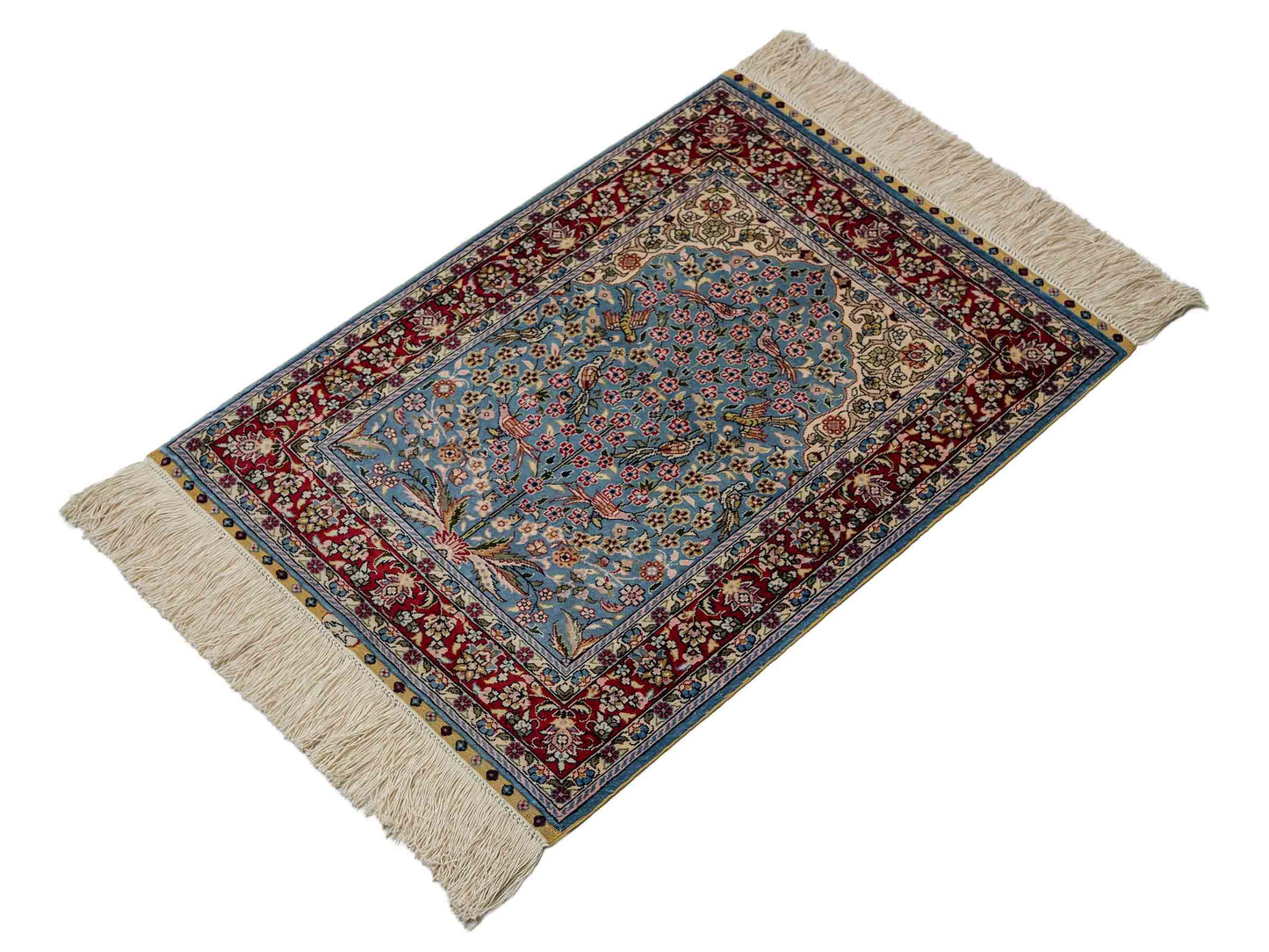 Sehr feiner, handgeknüpfter Khademi Orientteppich mit Hereke Design aus reiner Seide, blau, rot, creme. 65x47 cm. Vertrieb durch Jupiter Intl.