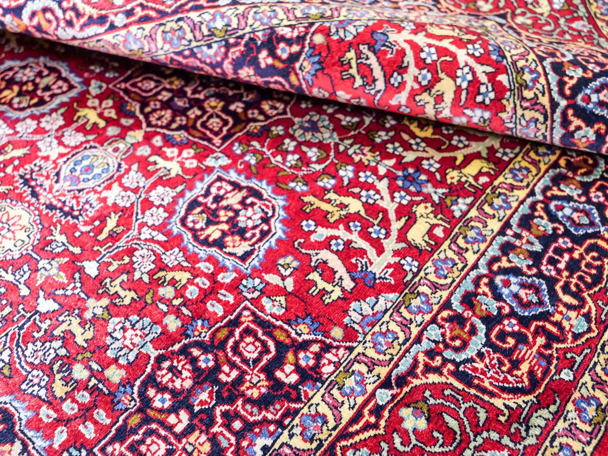 Sehr feiner, handgeknüpfter Khademi Orientteppich mit Hereke Design aus reiner Seide, rot. 92x62 cm. Vertrieb durch Jupiter Intl.