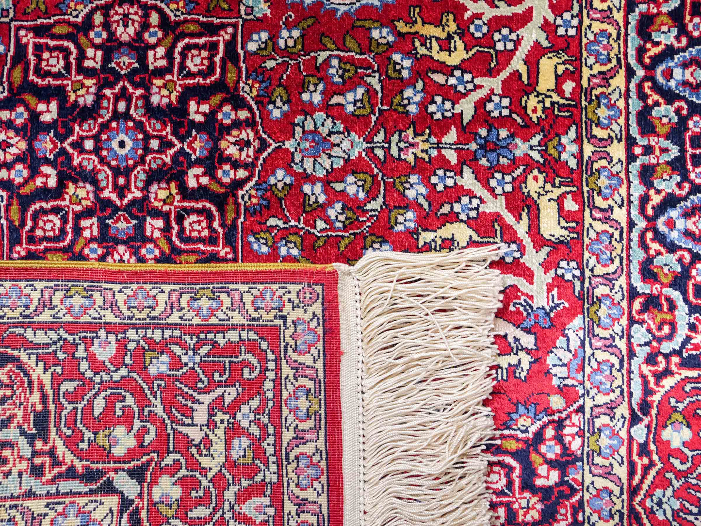 Sehr feiner, handgeknüpfter Khademi Orientteppich mit Hereke Design aus reiner Seide, rot. 92x62 cm. Vertrieb durch Jupiter Intl.
