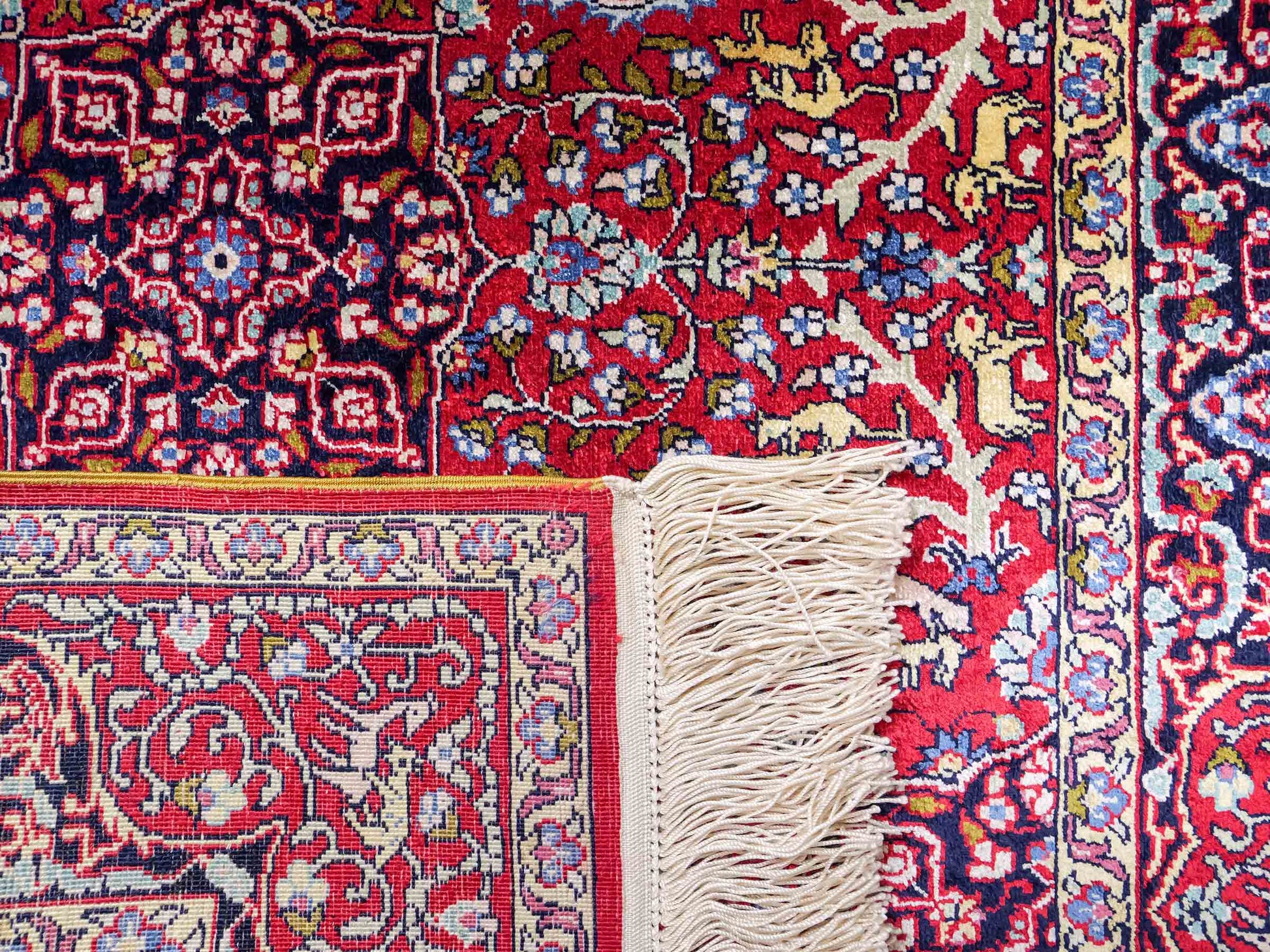 Sehr feiner, handgeknüpfter Khademi Orientteppich mit Hereke Design aus reiner Seide, rot. 92x62 cm. Vertrieb durch Jupiter Intl.