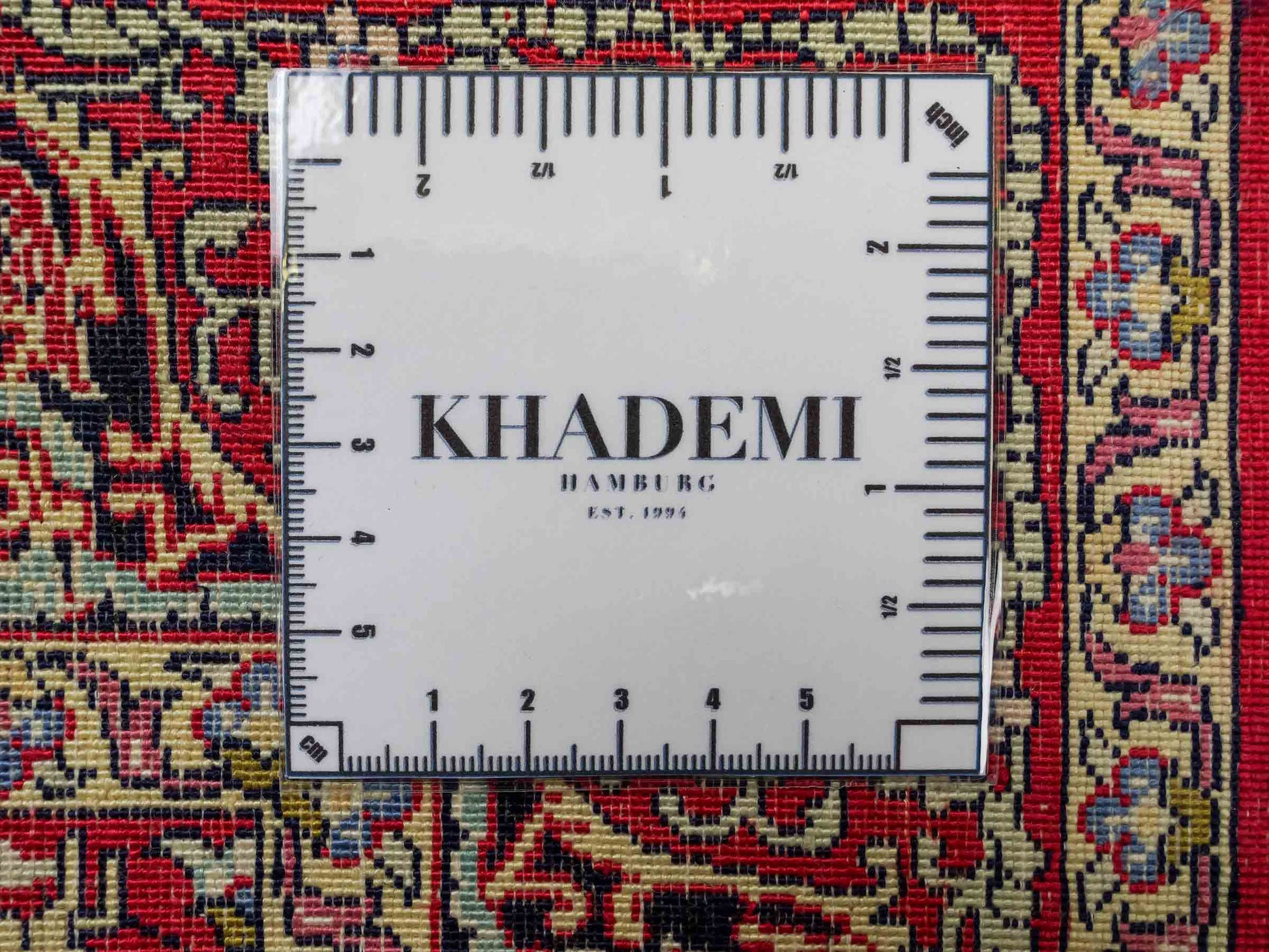 Sehr feiner, handgeknüpfter Khademi Orientteppich mit Hereke Design aus reiner Seide, rot. 92x62 cm. Vertrieb durch Jupiter Intl.