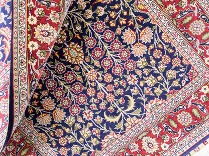 Sehr feiner, handgeknüpfter Khademi Orientteppich mit Hereke Design aus reiner Seide, blau, rot. 92x62 cm. Vertrieb durch Jupiter Intl.