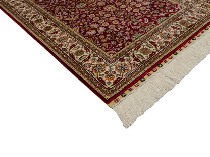 Sehr feiner, handgeknüpfter Khademi Orientteppich mit Hereke Design aus reiner Seide, rot, creme. 92x62 cm. Vertrieb durch Jupiter Intl.