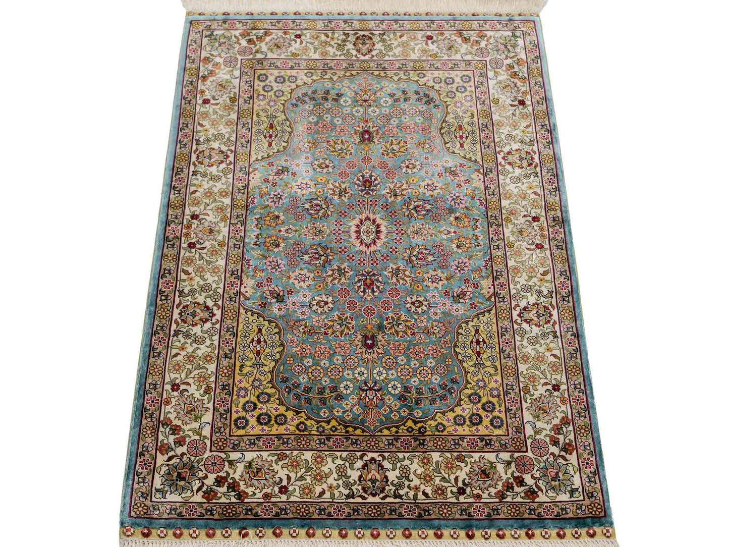 Sehr feiner, handgeknüpfter Khademi Orientteppich mit Hereke Design aus reiner Seide, blau, creme, beige. 93x63 cm. Vertrieb durch Jupiter Intl.