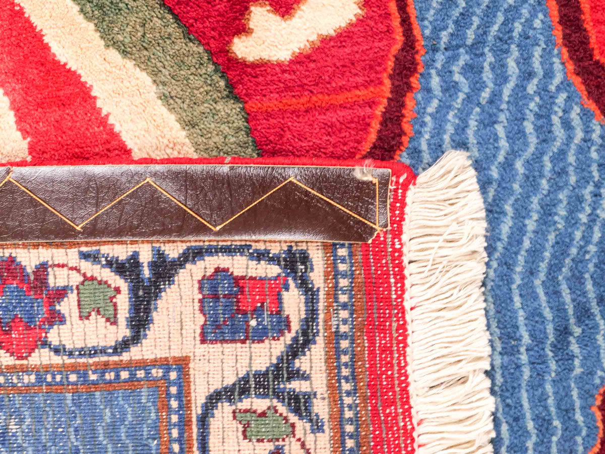 Handgeknüpfter Vintage Afghan Nomadenteppich von Khademi aus Wolle, mehrfarbig. Klassischer Wollteppich mit Bildmotiv. Orientteppich, traditionell von Hand geknüpft in Afghanistan. Größe: 189 x 128 cm. Teppichnummer: SB3-1123 | Jupiter Intl.